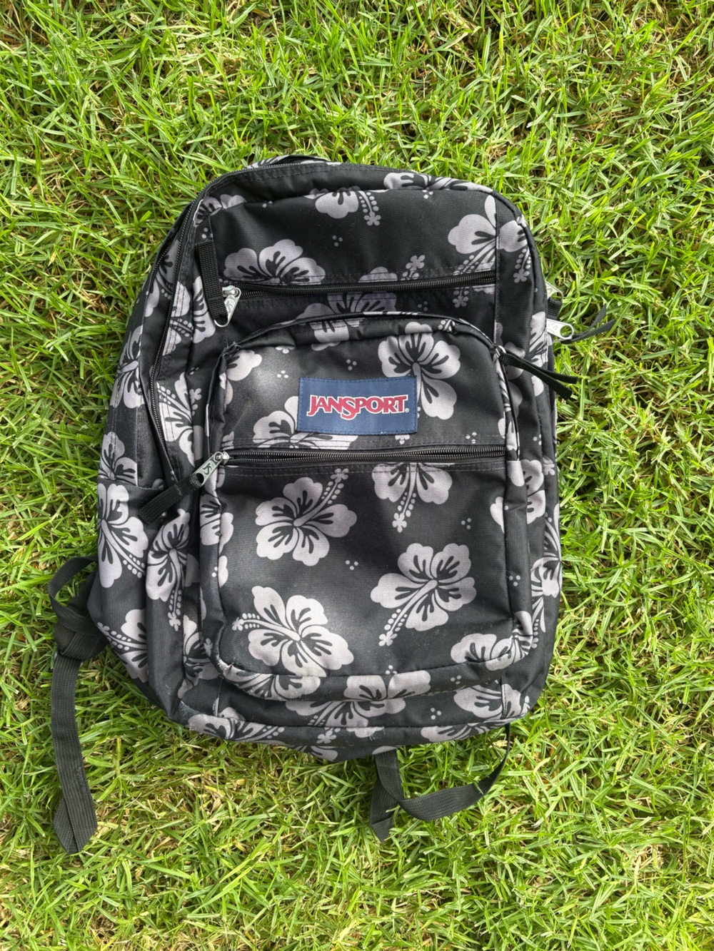 Jansport Black Backpack with Gray Floral Pattern